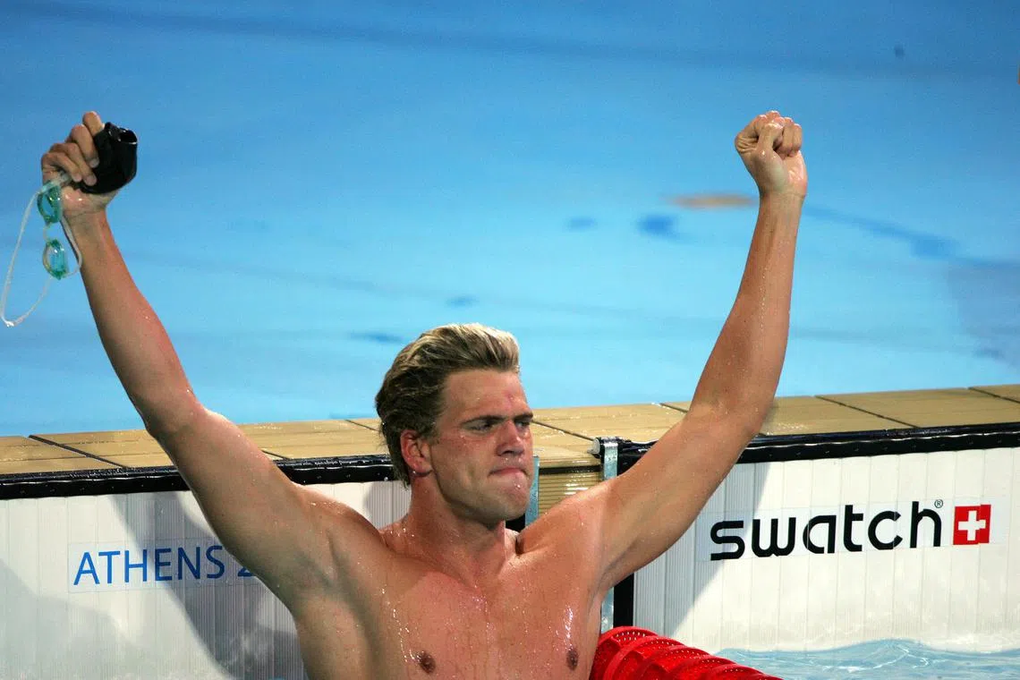 FILE PHOTO: USA swimmer Gary Hall Jr celebrates winning the gold medal 
Mens Swimming - 50m Freestyle Final,2004 Olympic Games, Athens, Greece 20/08/2004. Photo: Daiju Kitamura/Aflo/File Photo