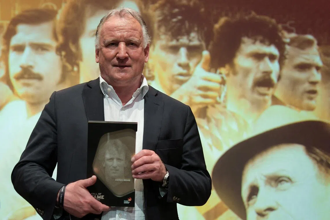 FILE PHOTO: German soccer legend Andreas Brehme poses after being included into the Hall of Fame, a permanent exhibition honouring German soccer legends at the German Football Museum in Dortmund, Germany, April 1, 2019.   REUTERS/Ina Fassbender/Pool/File Photo