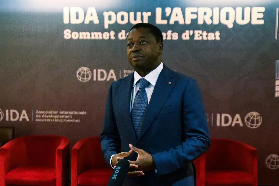 FILE PHOTO: Togo's President Faure Gnassingbe gives an interview during a meeting to discuss the 20th replenishment of the World Bank's International Development Association, in Abidjan, Ivory Coast July 15, 2021. REUTERS/Luc Gnago/File Photo