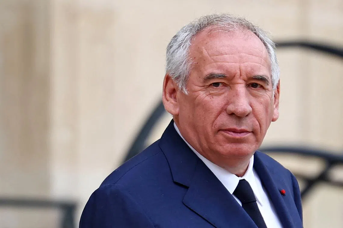 French Prime Minister Francois Bayrou leaves following the weekly cabinet meeting at the Elysee Palace in Paris, France, July 16, 2025. REUTERS/Abdul Saboor