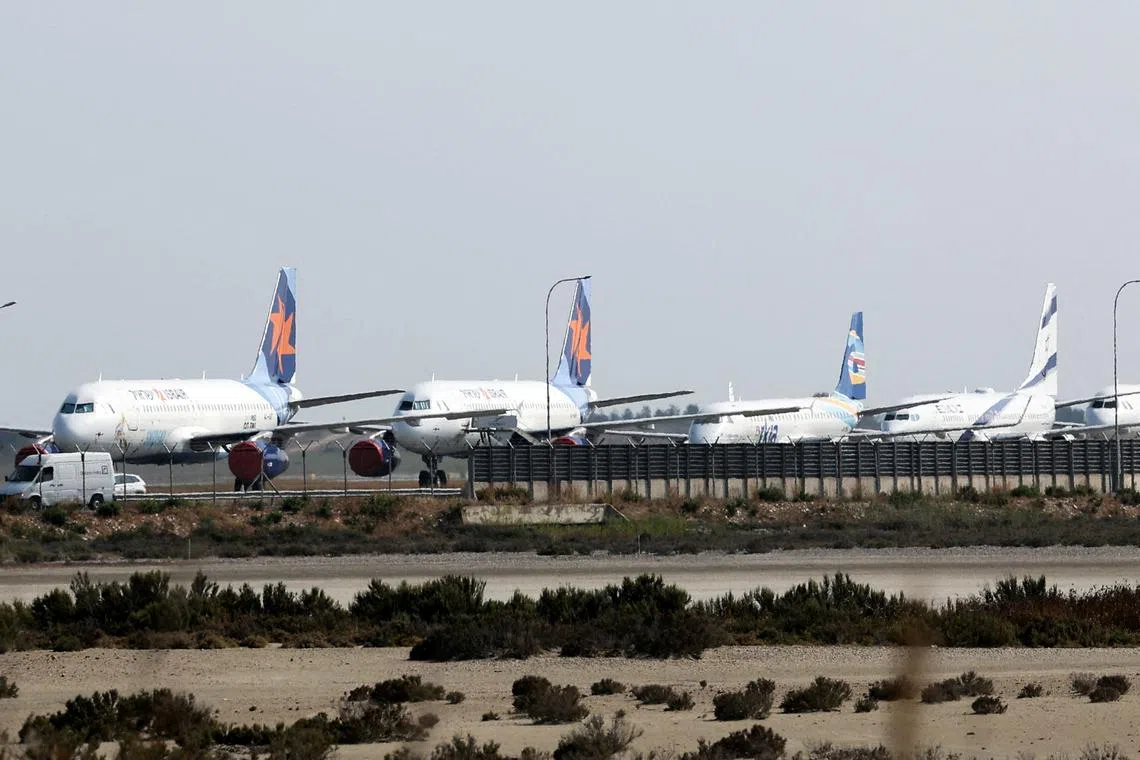 FILE PHOTO: Aircraft belonging to Israel's state carrier El Al and Israir among other airlines, are parked at Larnaca International Airport, in Larnaca, Cyprus June 16, 2025. REUTERS/Yiannis Kourtoglou/File Photo