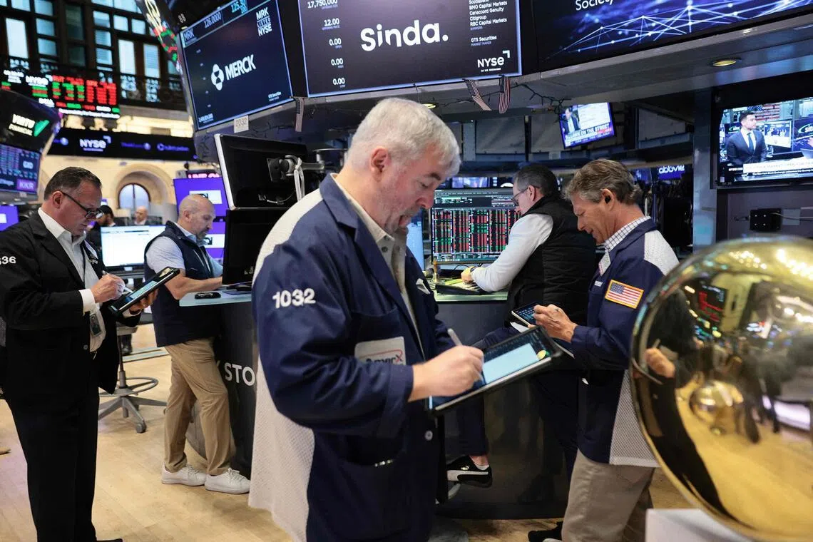 NEW YORK, NEW YORK - JUNE 26: Traders work on the floor of the New York Stock Exchange during morning trading on June 26, 2026 in New York City. Stocks continued a downward trend with all three major indexes in the red at opening amid an announcement by OpenAI that it is considering delaying its IPO.   Michael M. Santiago/Getty Images/AFP (Photo by Michael M. Santiago / GETTY IMAGES NORTH AMERICA / Getty Images via AFP)