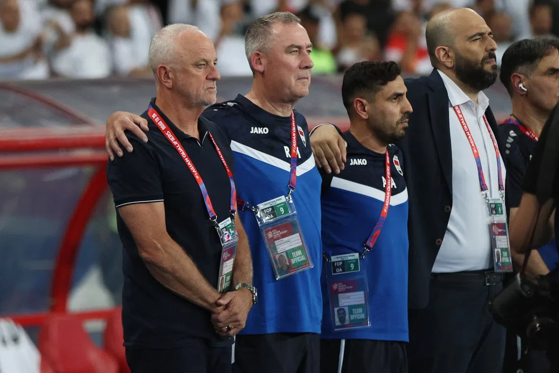 Soccer Football - World Cup - AFC Qualifiers - Group B - Iraq v South Korea - Basra International Stadium, Basra, Iraq - June 5, 2025  Iraq coach Graham Arnold and Rene Meulensteen REUTERS/Thaier Al-Sudani