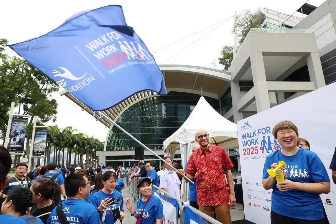 pixsbf09// President Tharman flagging off EmployWell - Walk for Work 2025 at Marina Bay Sands, where more than 1000 business leaders and employees participated in 4-km charity walk around Marina Bay and raised more than SGD 1.45 million for inclusive employment.
With him were Ms Jean Tan, CEO of SBF Foundation, (left to right), Mr Teo Siong Seng, Chairman of SBF, and Ms Janet Ang, Chairman of SBF Foundation and Mr Suhaimi Bin Zainul Abidin, Board of Director of SBF Foundation, Mr Kok Ping Soon, CEO of SBF.