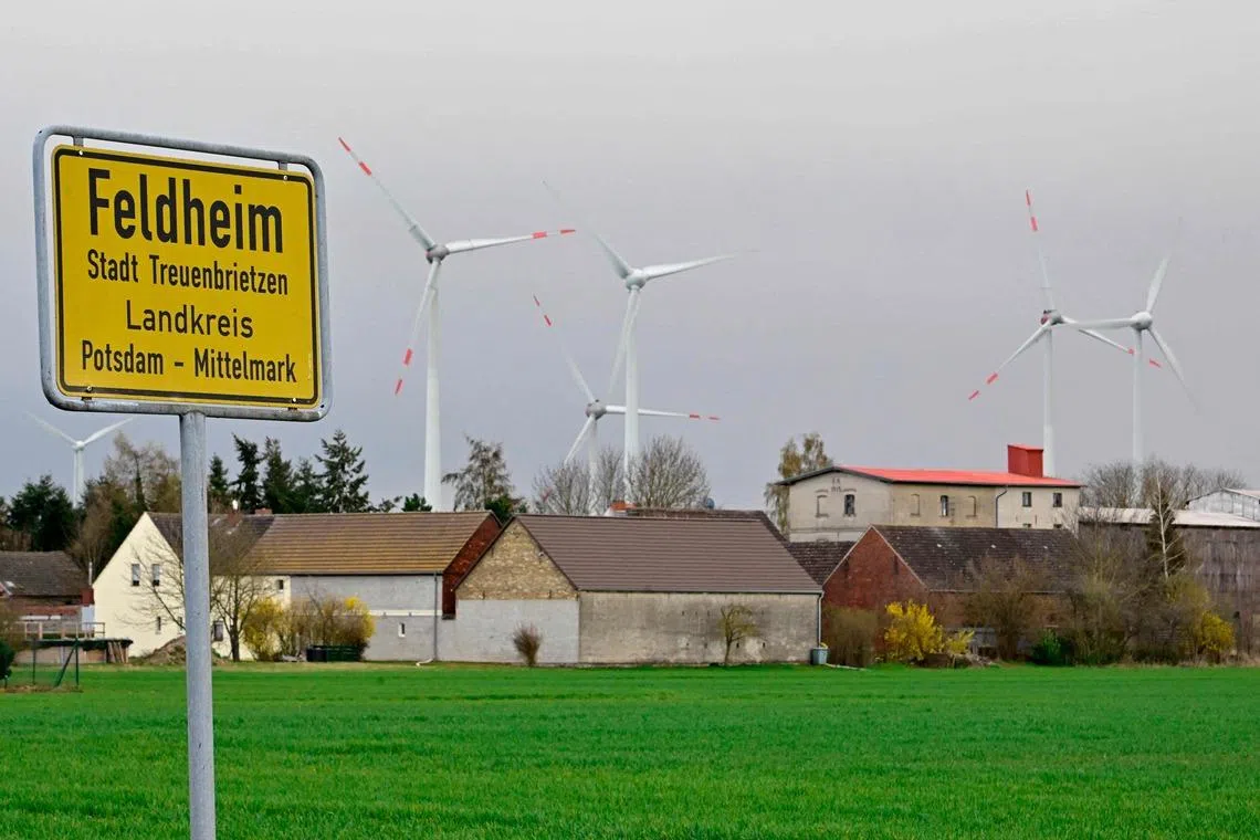 German ‘green village’ rides out Middle East energy storm
