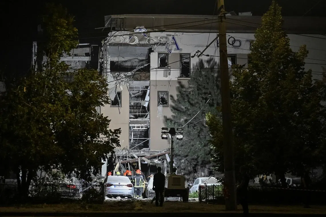 FILE PHOTO: Rescuers work at a site of a Russian missile strike, amid Russia's attack on Ukraine, in Kryvyi Rih, Ukraine August 27, 2024. REUTERS/Stringer/File Photo