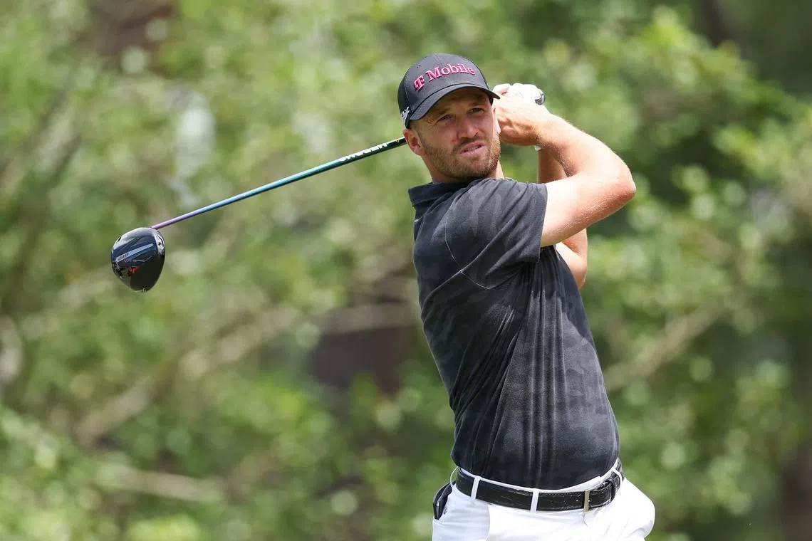 Wyndham Clark of the United States plays his shot from the 11th tee during a practice round prior to the US Open.