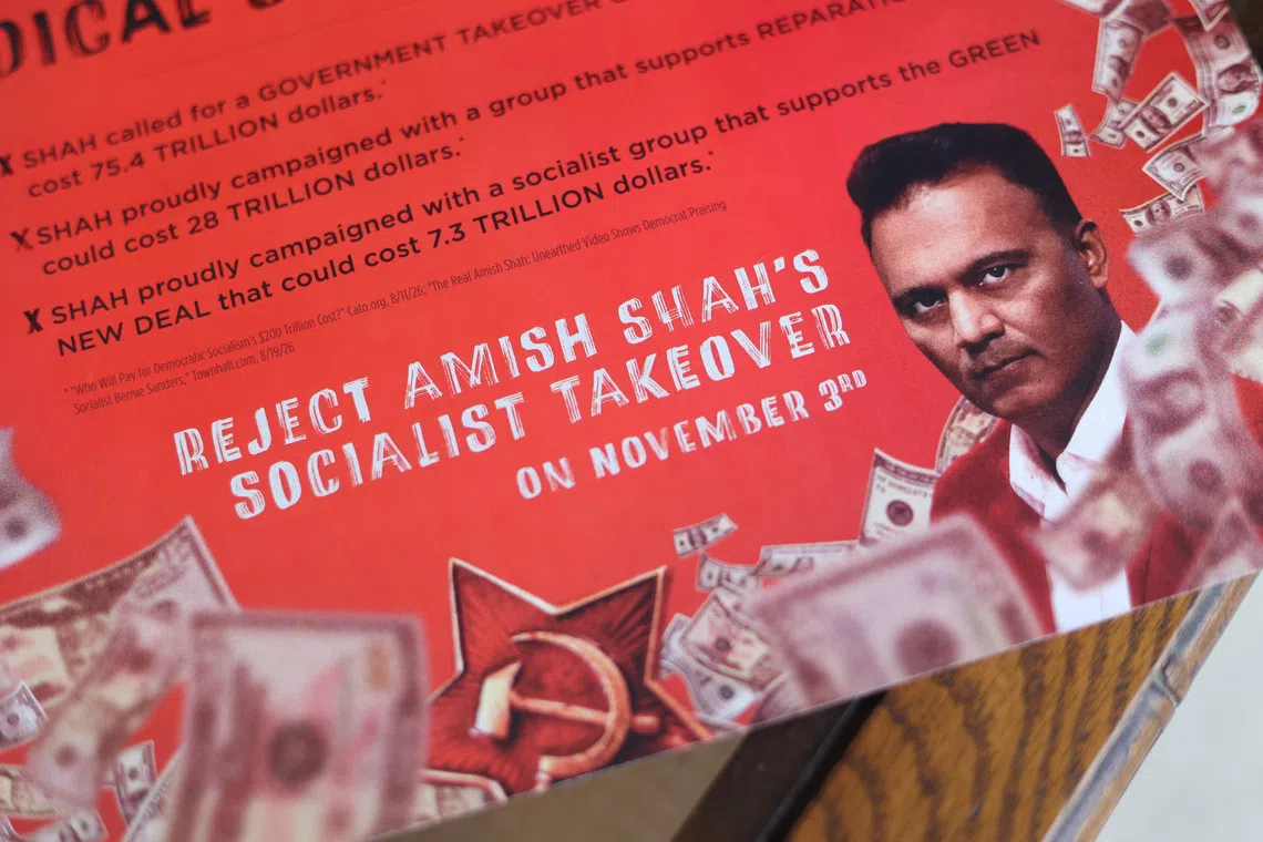A flyer depicting congressional candidate Amish Shah as a socialist is displayed in Phoenix, Arizona, US, September 24, 2026.  REUTERS/Erica Stapleton/Illustration