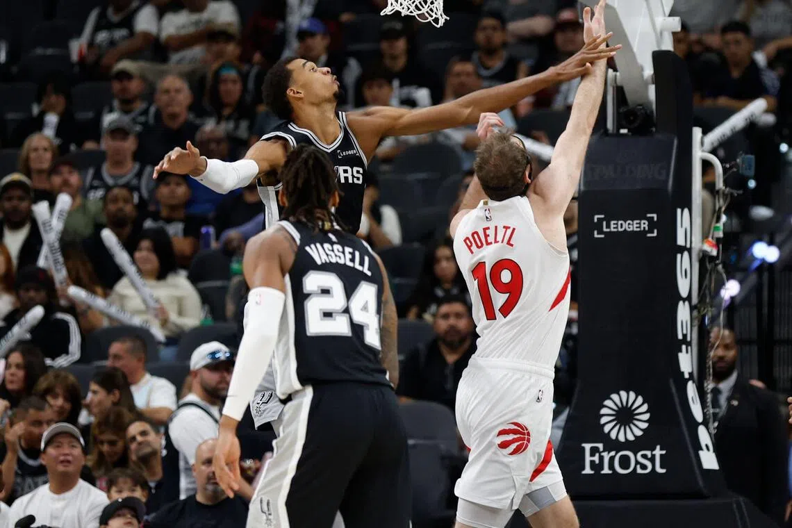 Victor Wembanyama of the San Antonio Spurs blocking a shot against Jacob Poelti of the Toronto Raptors in the second half of a 121-103 win at Frost Bank Centre on Oct 27, 2025 in San Antonio, Texas. He leads the National Basketball Association in blocks, averaging 4.8 per game.