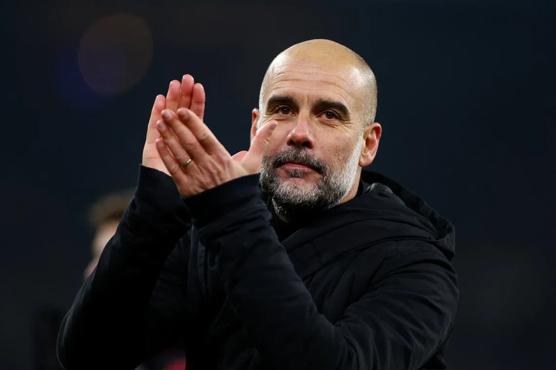 Soccer Football - Champions League - Round of 16 - First Leg - FC Copenhagen v Manchester City - Parken, Copenhagen, Denmark - February 13, 2024 Manchester City manager Pep Guardiola celebrates after the match Action Images via Reuters/Matthew Childs/ File photo