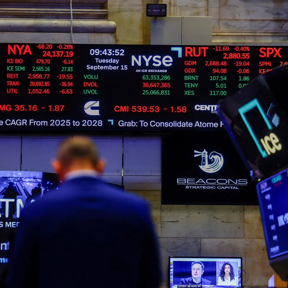 A screen displays stock market information after the opening bell at the New York Stock Exchange in New York City, on Sept 15.