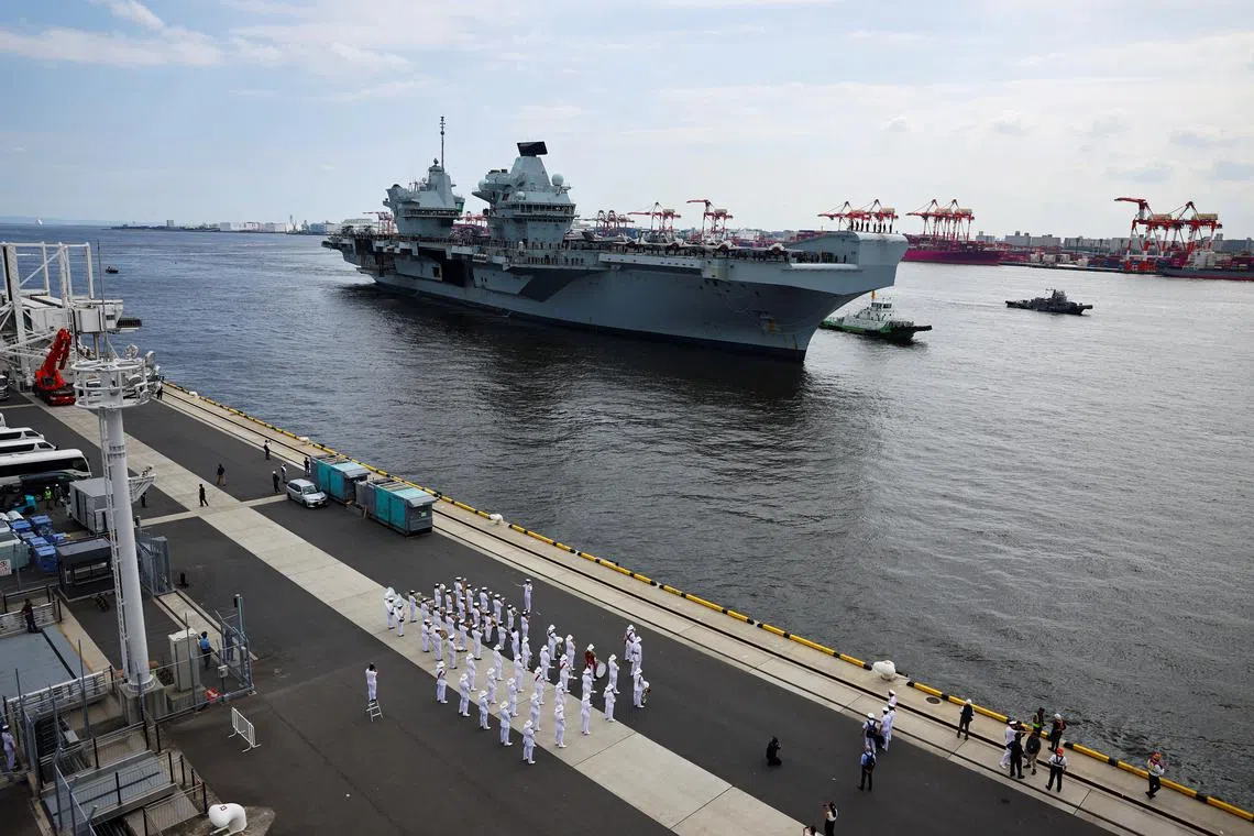 Britain's HMS Prince of Wales aircraft carrier, flagship of the UK Carrier Strike Group (CSG), arrives at Tokyo International Cruise Terminal within the Tokyo Port in Tokyo, Japan August 28, 2025.   REUTERS/Issei Kato