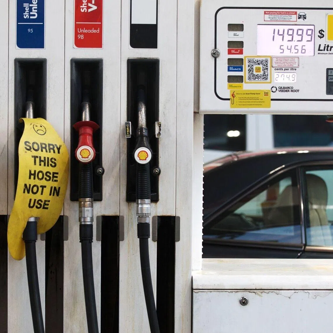 A 'Sorry This Hose Is Not In Use' sign covers a pump at a Shell petrol station in Sydney, Australia, on Wednesday, March 25, 2026. Hundreds of service stations across Australia have reported fuel shortfalls, as the war in the Middle East disrupts global supplies. Photographer: Brent Lewin/Bloomberg