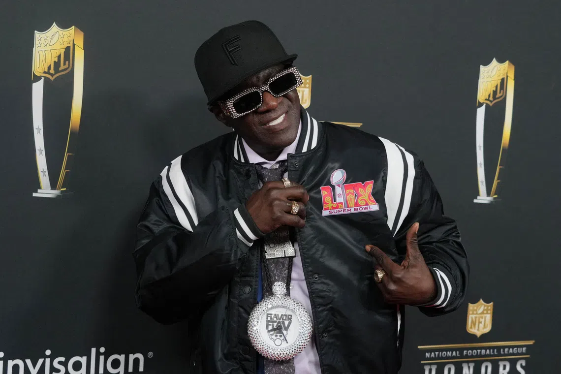 Feb 6, 2025; New Orleans, LA, USA; Flavor Flav on the red carpet before Super Bowl LIX NFL Honors at Saenger Theatre. Mandatory Credit: Kirby Lee-Imagn Images