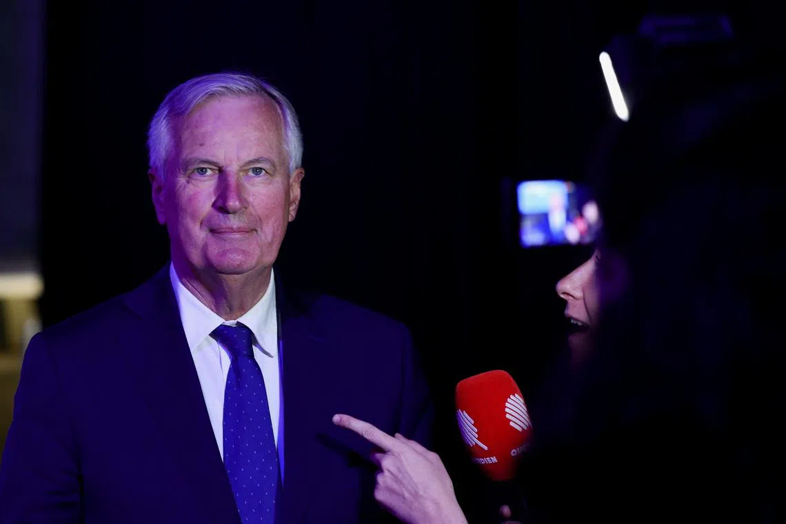 FILE PHOTO: Former EU chief negotiator and Les Republicains (LR) right-wing party member Michel Barnier attends a political campaign rally of Valerie Pecresse, head of the Paris Ile-de-France region and LR candidate in the 2022 French presidential election, in Paris, France, April 3, 2022. REUTERS/Sarah Meyssonnier/File Photo