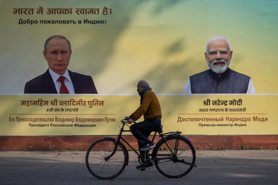 Russia's Putin arrives in India for summit talks with PM Modi