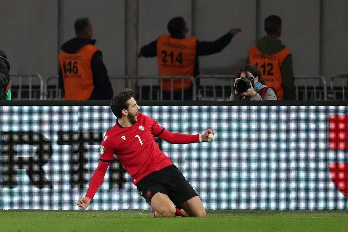 FILE PHOTO: Soccer Football - UEFA Euro 2024 Qualifier - Group A - Georgia v Scotland - Boris Paichadze Dinamo Arena, Tbilisi, Georgia -  November 16, 2023 Georgia's Khvicha Kvaratskhelia celebrates scoring their second goal REUTERS/Irakli Gedenidze/File Photo