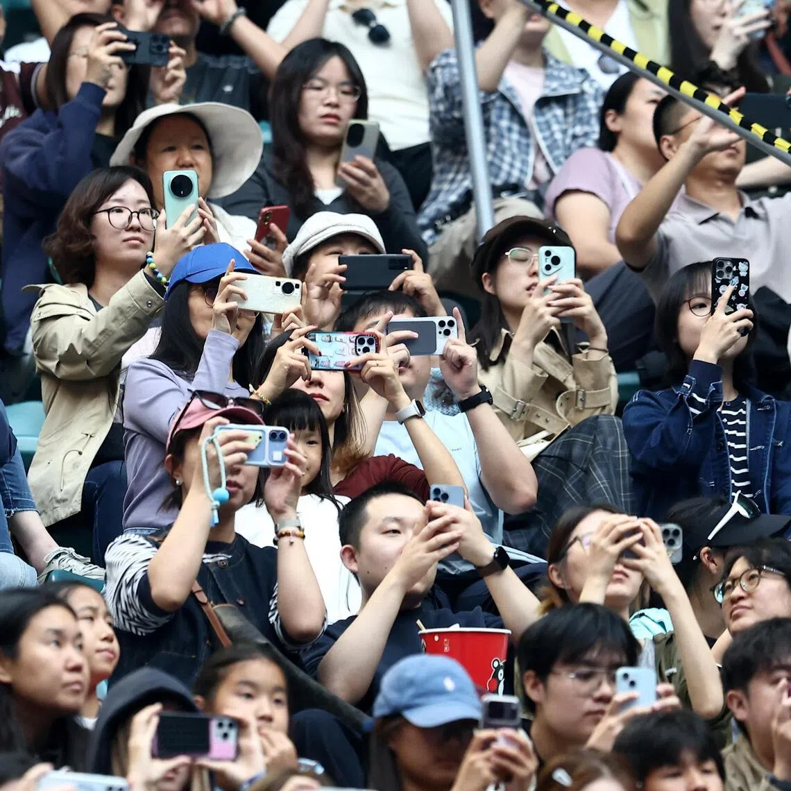 Local fans packed the stands for the last-64 match between China’s Zheng Qinwen and Russia’s Anna Kalinskaya at the China Open in Beijing on Oct 3.