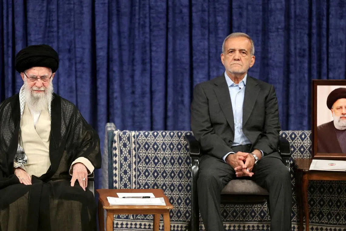 FILE PHOTO: Iran's Supreme Leader Ayatollah Ali Khamenei and Iran's new president, Masoud Pezeshkian, attend an endorsement ceremony in Tehran, Iran, July 28, 2024. Office of the Iranian Supreme Leader/WANA (West Asia News Agency)/Handout via REUTERS./File Photo