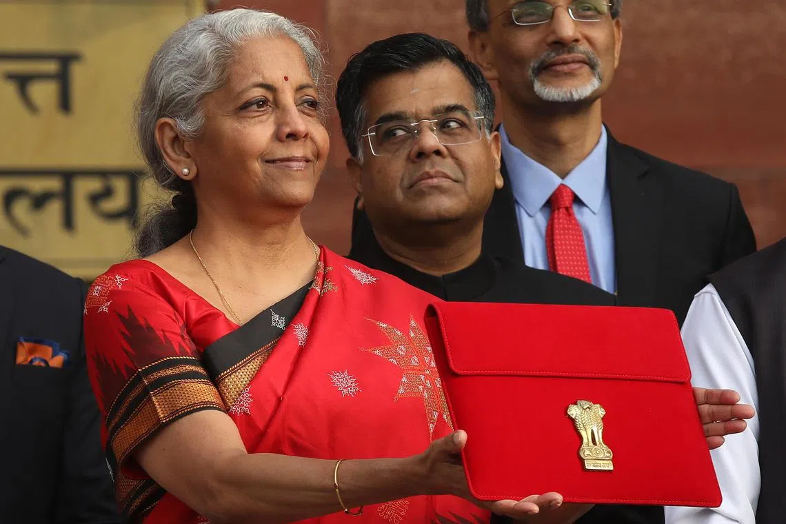 epa10442067 Indian Finance Minister Nirmala Sitharaman  holds a folder containing Union Budget documents outside the Ministry of Finance in New Delhi, India, 01 February 2023. The Union Budget 2022-23 will be presented in the parliament by the country's finance minister Nirmala Sitharaman.  EPA-EFE/RAJAT GUPTA
