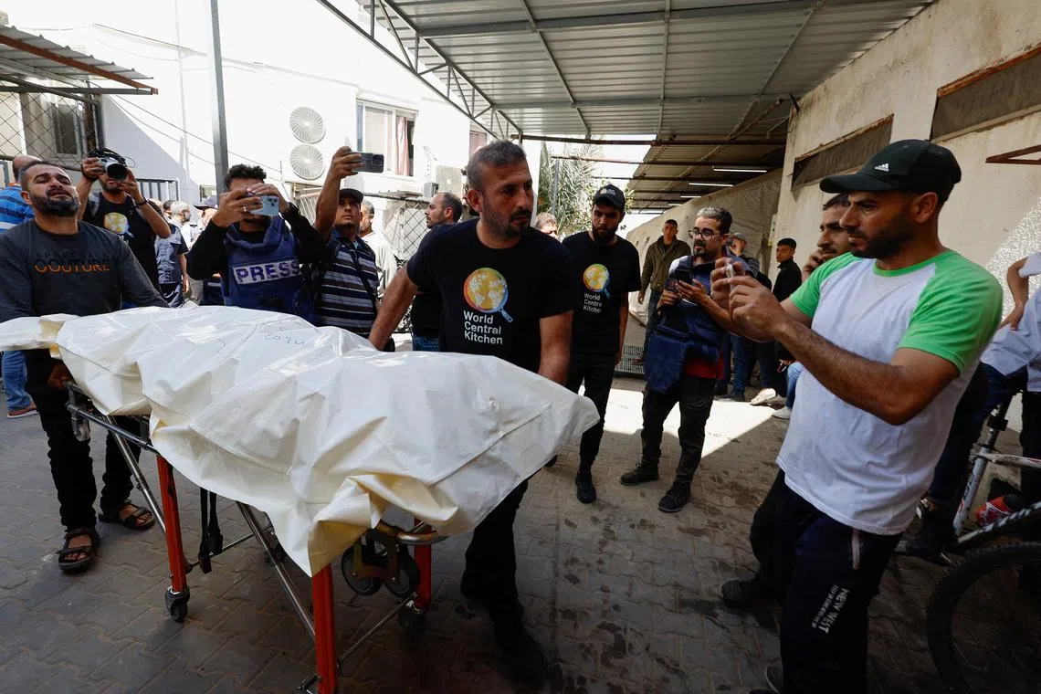 Bodies of foreign aid workers killed in Israeli strike leave Gaza | The ...