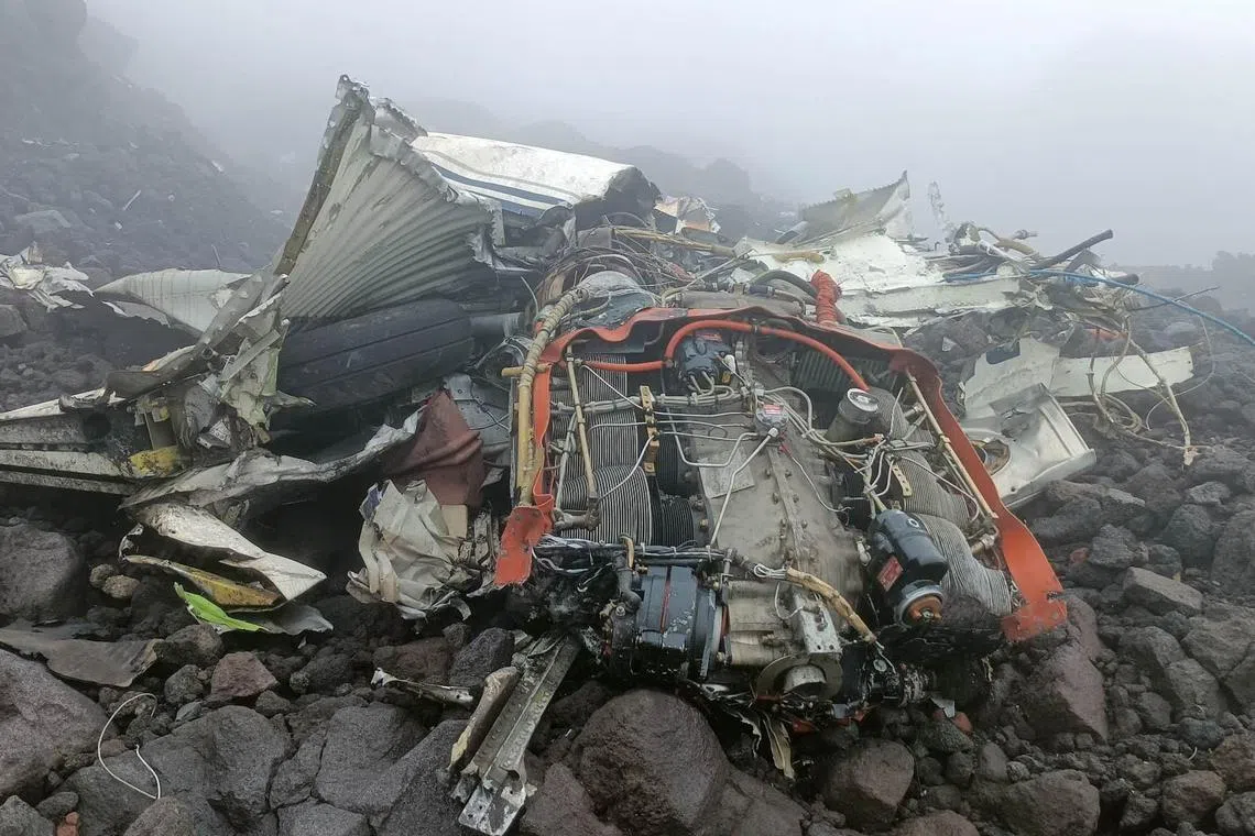 The wreckage of the Cessna 340 aircraft lay atop Mayon Volcano, in Camalig, Albay province, Philippines, February 24, 2023. Office of Mayor Caloy G. Baldo/Handout via REUTERS THIS IMAGE HAS BEEN SUPPLIED BY A THIRD PARTY, NO RESALES. NO ARCHIVES
