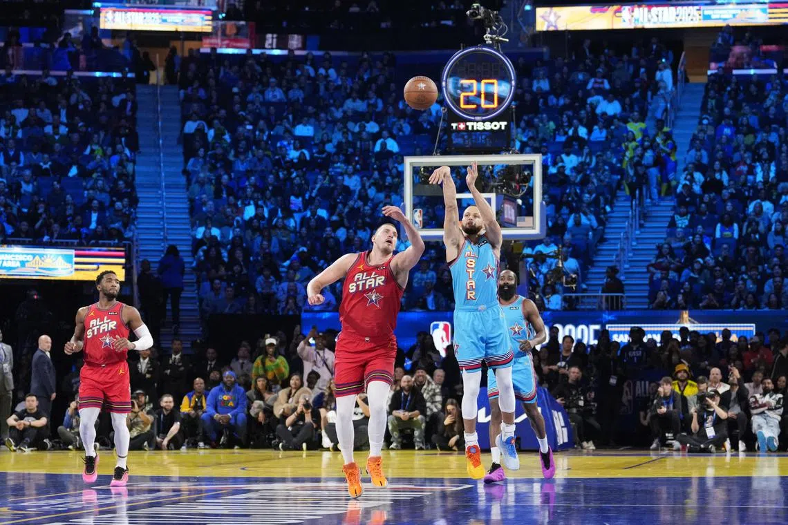 Stephen Curry of the Golden State Warriors shoots against Nikola Jokic of the Denver Nuggets during the 2025 NBA All Star Game at Chase Center. 