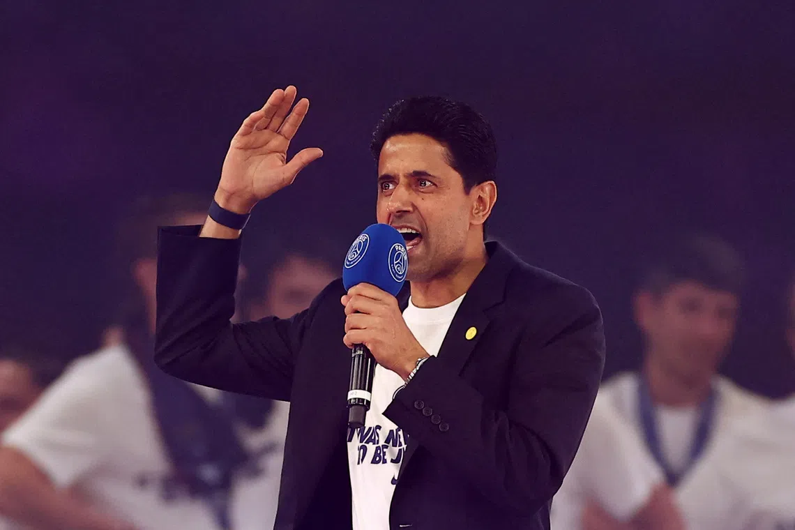 Soccer Football - UEFA Champions League - Paris St Germain celebrate winning the UEFA Champions League Final - Parc des Princes, Paris, France - May 31, 2026 Paris St Germain president Nasser al-Khelaifi talks to the fans after winning the UEFA Champions League Final REUTERS/Abdul Saboor