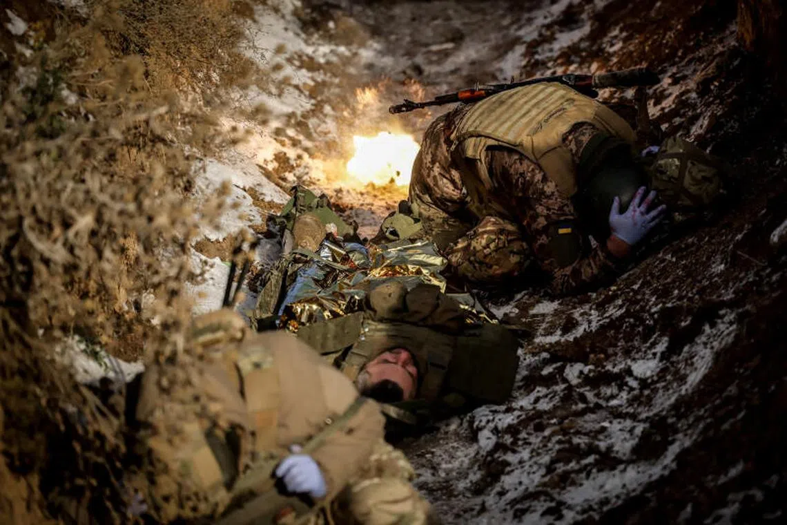Servicemen of 24th Mechanized brigade named after King Danylo of the Ukrainian Armed Forces take part in a tactical medicine exercise, amid Russia's attack on Ukraine, in Donetsk region, Ukraine December 14, 2024. Oleg Petrasiuk/Press Service of the 24th King Danylo Separate Mechanized Brigade of the Ukrainian Armed Forces/Handout via REUTERS ATTENTION EDITORS - THIS IMAGE HAS BEEN SUPPLIED BY A THIRD PARTY.
