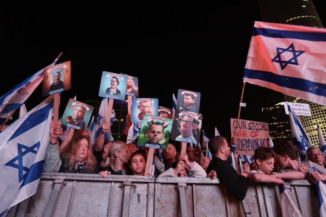 Israelis protest against the government's controversial justice reform Bill in Tel Aviv on March 4, 2023. 