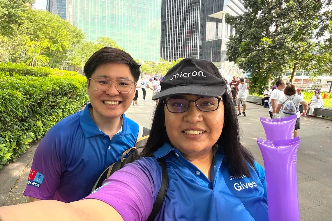 Micron engineer Varsha Siri Pamarthy (seen here with Mr Chee) regularly takes part in volunteering events organised by the company.