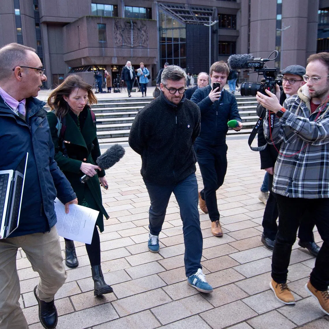 Former footballer Joey Barton leaves Liverpool Crown Court after sentencing following his guilty verdict for online harassment in Liverpool, Britain, December 8, 2025. REUTERS/Peter Powell