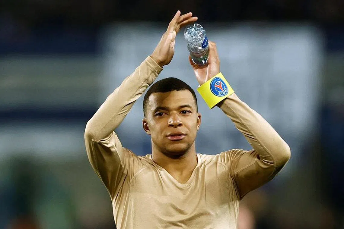 FILE PHOTO: Soccer Football - Ligue 1 - RC Strasbourg v Paris St Germain - Stade de la Meinau, Strasbourg, France - February 2, 2024 Paris St Germain's Kylian Mbappe celebrates after the match REUTERS/Christian Hartmann