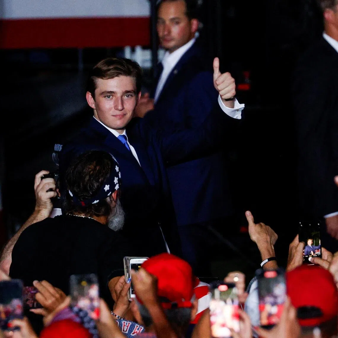 Barron William Trump, son of Republican presidential candidate and former U.S. President Donald Trump,gives a thumbs up at a campaign rally at Trump's golf resort in Doral, Florida, U.S., July 9, 2024.  REUTERS/Marco Bello 

