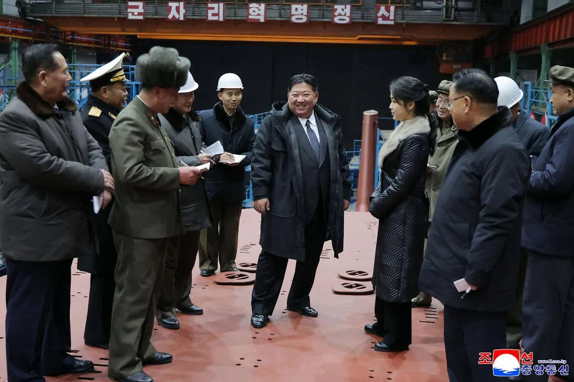 North Korean leader Kim Jong Un and his daughter Ju Ae visited the manufacturing site of an 8,700-tonnage nuclear-powered strategic guided missile submarine at an undisclosed location in North Korea. 