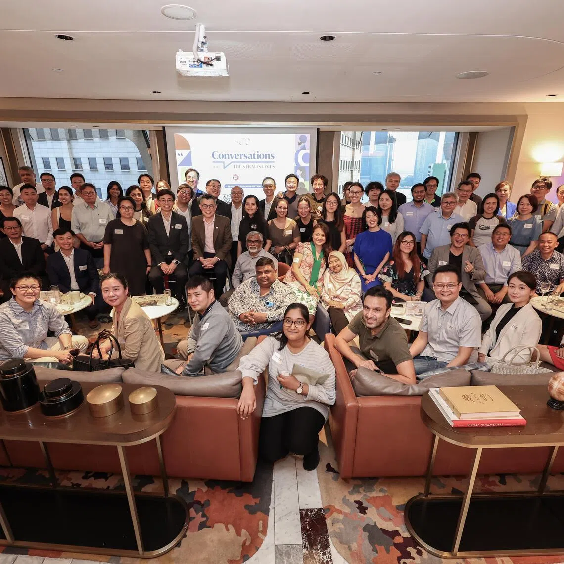 Straits Times leaders with attendees of the fourth edition of the "Conversations with ST" engagement series at the Centennial Tower on July 29.