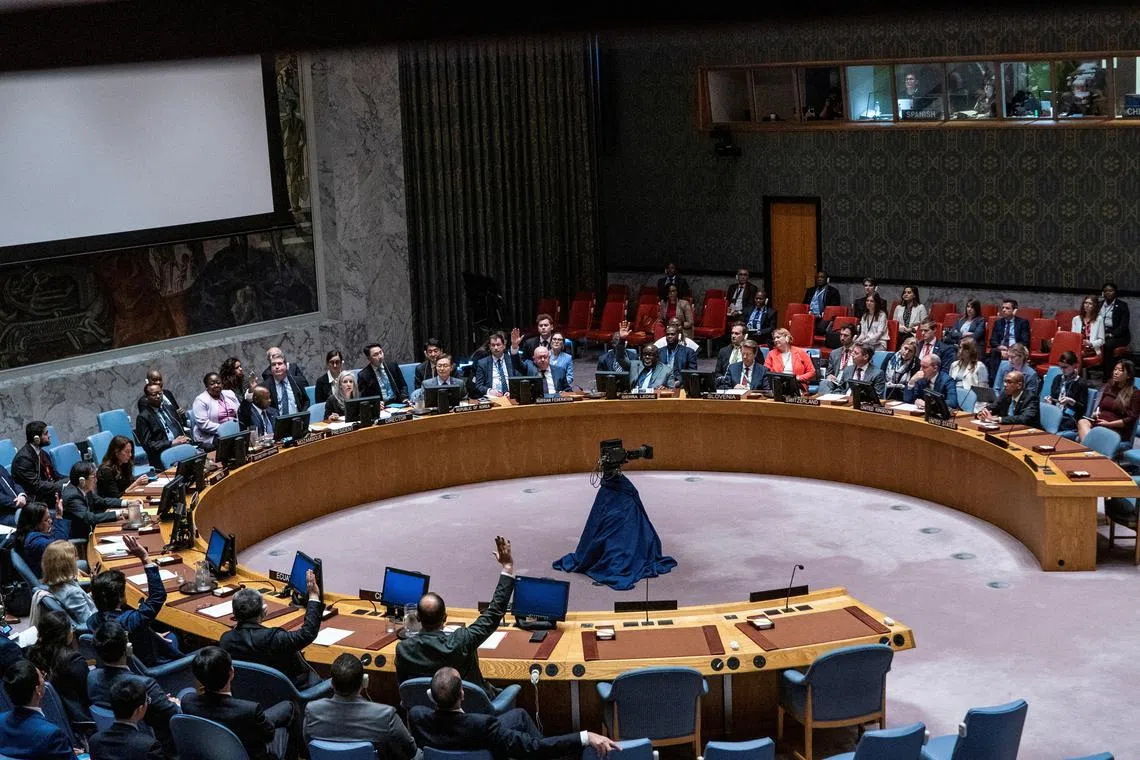 FILE PHOTO: Members of the United Nations Security Council vote on a resolution on non-proliferation during a meeting on the maintenance of International Peace and Security Nuclear disarmament and non-proliferation at U.N. headquarters in New York City, U.S., May 20, 2024. REUTERS/Eduardo Munoz/File Photo