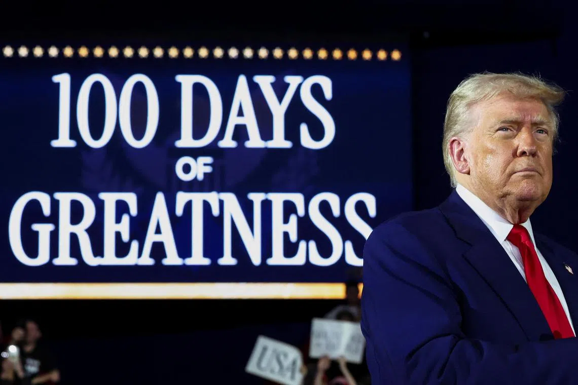US President Donald Trump attends a rally to mark his 100th day in office, at Macomb Community College on April 29.