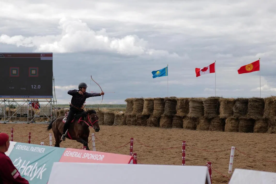 kxhorse10 - Mr Syed Idrus competing in horseback archery at the World Nomad Games in Astana, Kazakhstan.

Credit: Courtesy of Mou Zongxiao