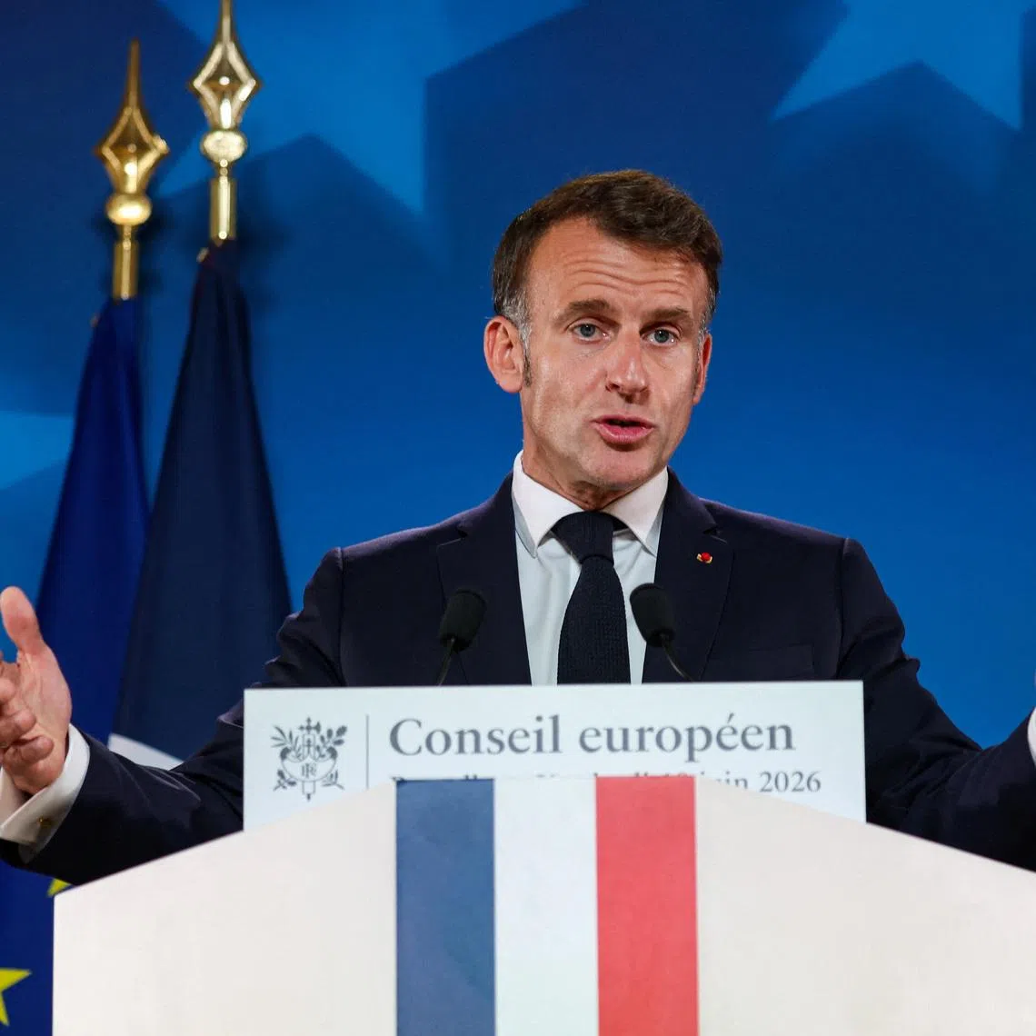French President Emmanuel Macron speaks to the media following a European Union leaders'summit in Brussels, Belgium, June 19, 2026. REUTERS/Laia Ros