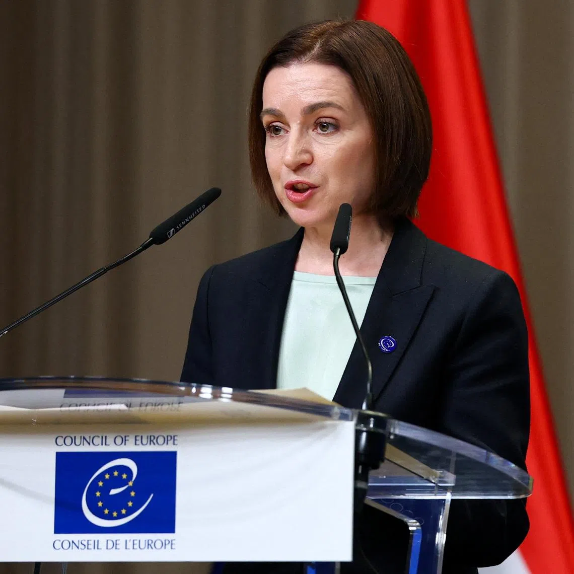 Moldovan President Maia Sandu speaks during a Council of Europe diplomatic conference to launch the International Claims Commission for Ukraine, aimed at handling compensation claims related to Russia's war in Ukraine, in The Hague, Netherlands, December 16, 2025. REUTERS/Piroschka van de Wouw