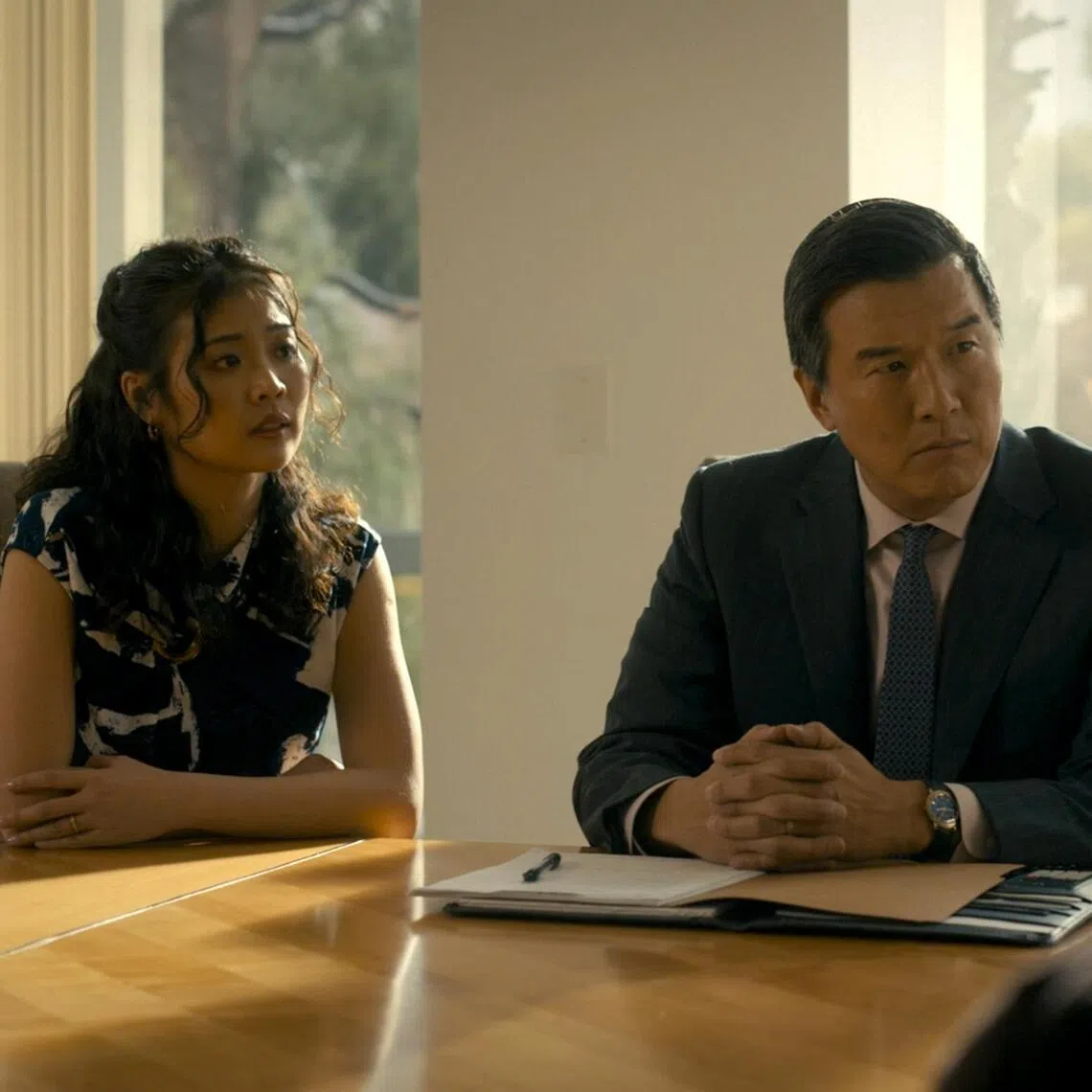 Singaporean actress Valerie Loo (left) portrays an interpreter for a Singaporean businessman in the American crime drama Countdown.