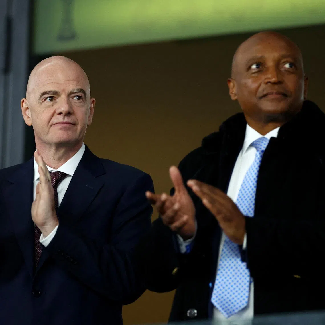 Soccer Football - CAF Africa Cup of Nations - Morocco 2025 - Round of 16 - South Africa v Cameroon - Al Medina Stadium, Rabat, Morocco - January 4, 2026 FIFA president Gianni Infantino and CAF president Patrice Motsepe in the stands before the match REUTERS/Siphiwe Sibeko