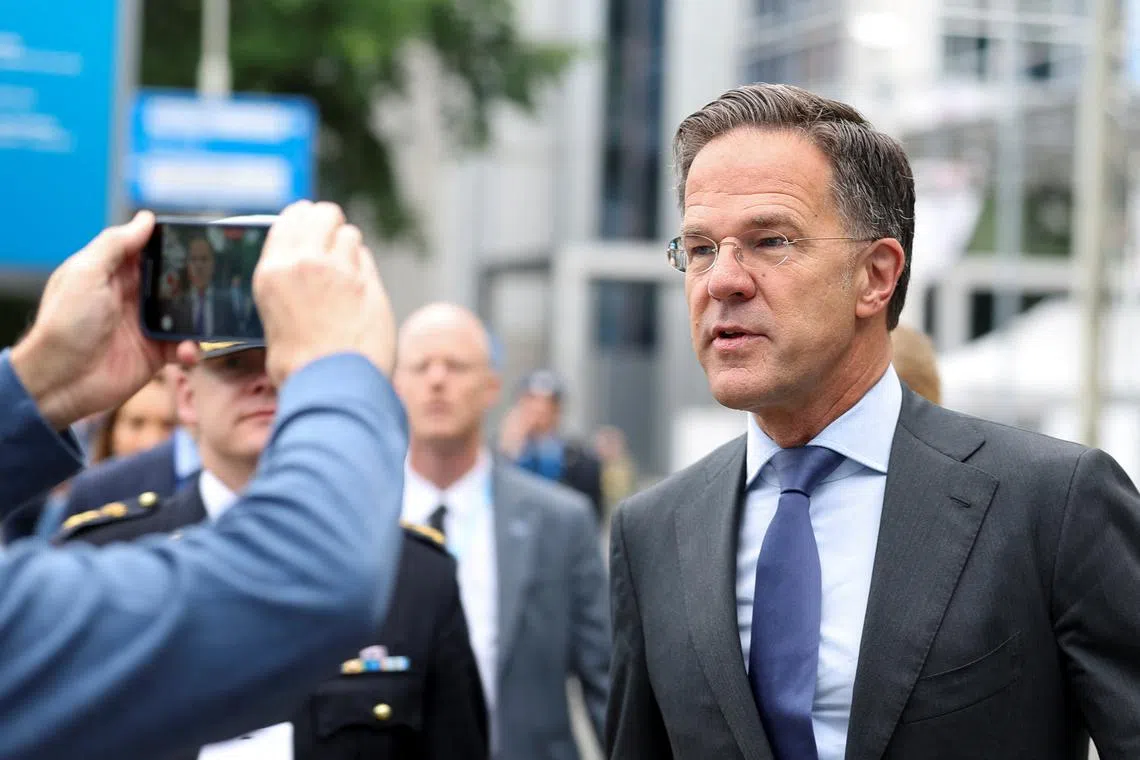 NATO Secretary General Mark Rutte looks on as he walks at the venue of the NATO Summit, in The Hague, Netherlands June 24, 2025. REUTERS/Toby Melville