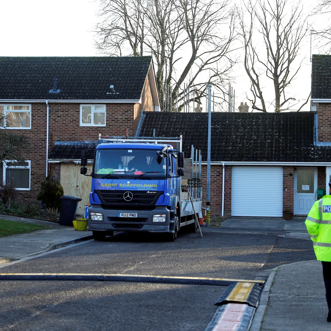 A police officer walks in front of the house of former spy Sergei Skripal, in Salisbury, Britain January 9, 2019. REUTERS/Peter Nicholls