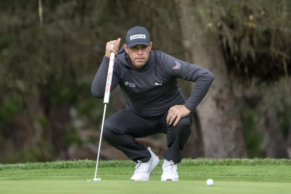 FILE PHOTO: January 30, 2025; Pebble Beach, California, USA; Gary Woodland lines up his putt on the 11th hole during the first round of the AT&T Pebble Beach Pro-Am golf tournament at Spyglass Hill Golf Course. Mandatory Credit: Kyle Terada-Imagn Images/File Photo