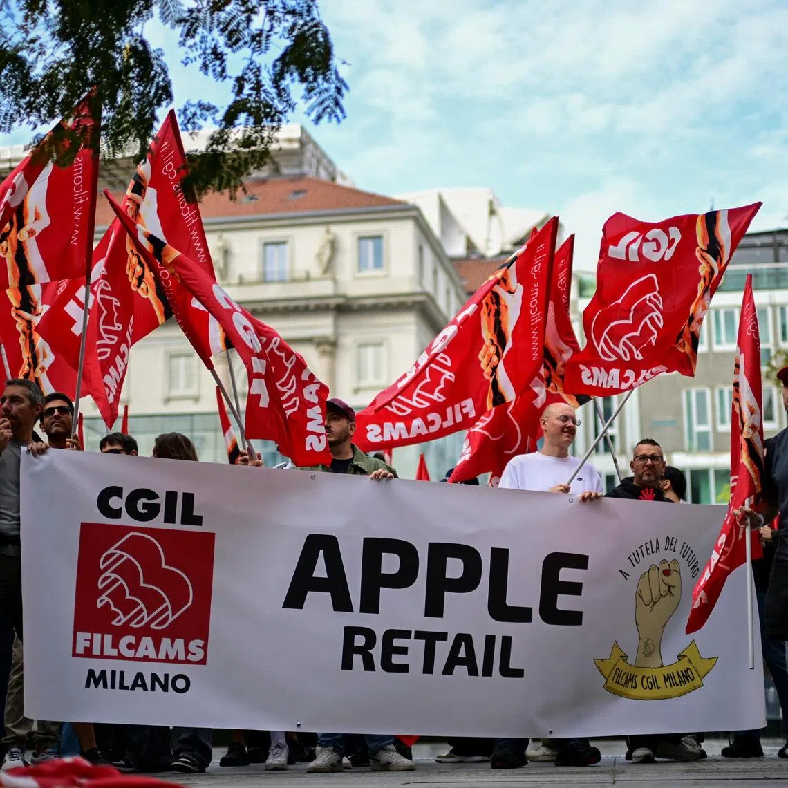 Apple store employees protesting outside the company’s flagship store in Milan on Sept 18.