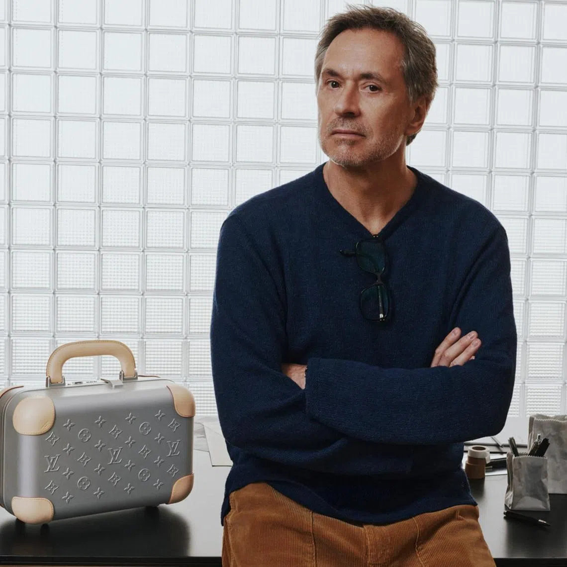 Marc Newson with the Horizon Aluminum suitcase and vanity case.