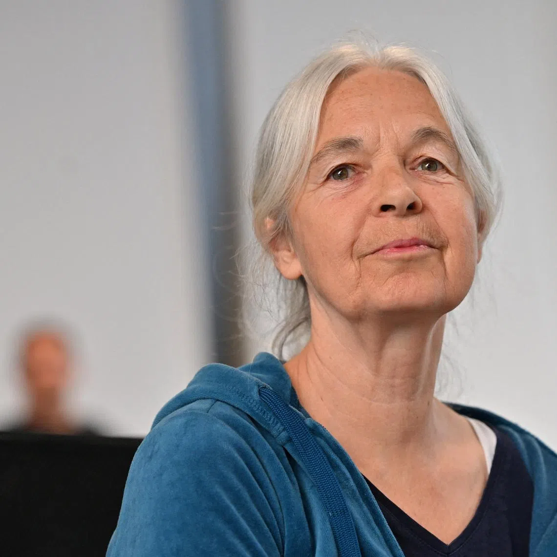 Daniela Klette, accused of being one of the last surviving members of the Red Army Faction group, who was arrested after decades on the run for armed robbery and attempted murder attends her trial in Verden, northern Germany, May 27, 2026.    Sina Schuldt/Pool via REUTERS