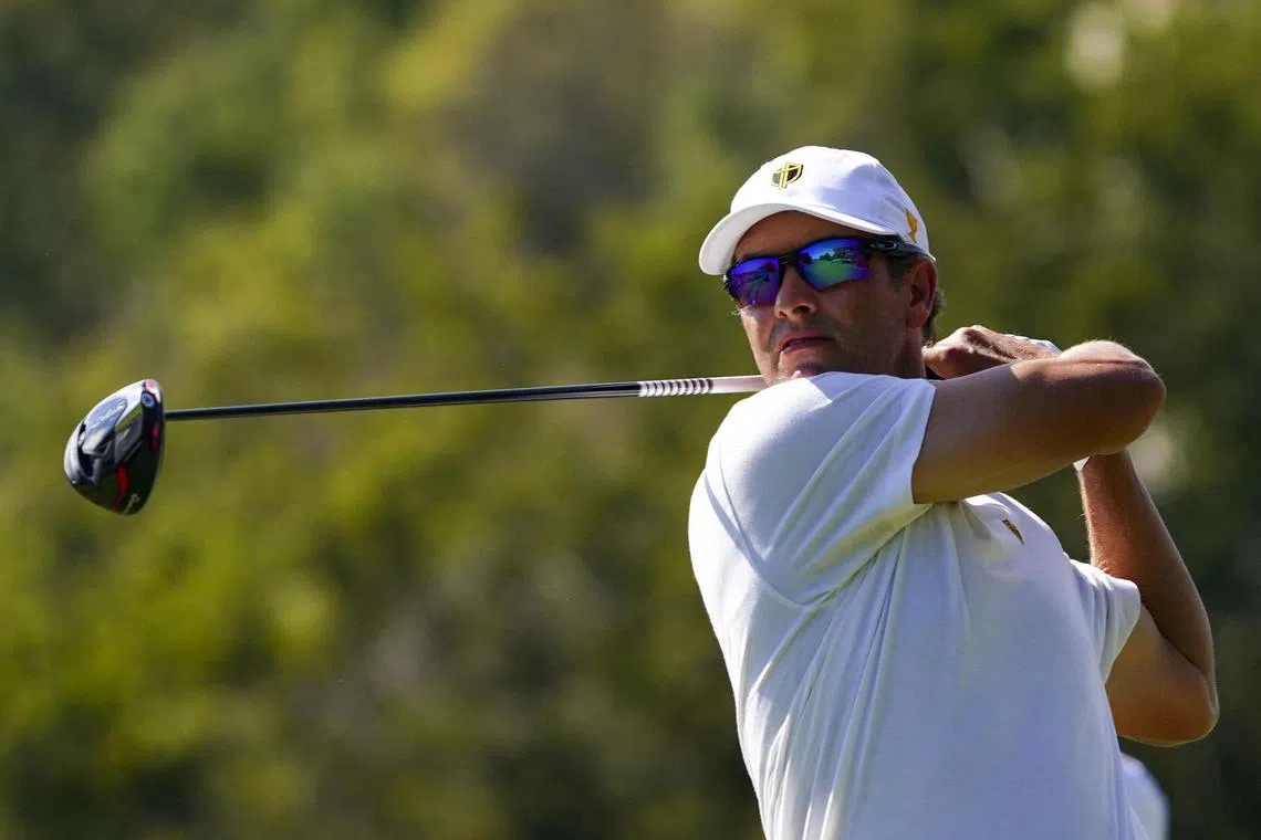 Australia's Adam Scott shot a 66 for the early clubhouse lead before finishing the day in a group tied for fourth at five-under.